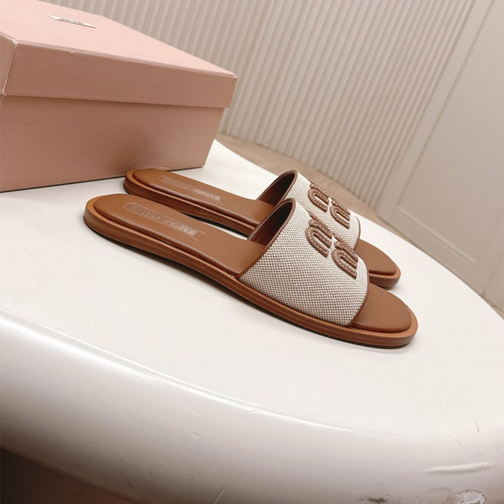 MiuMiu Canvas and leather slides