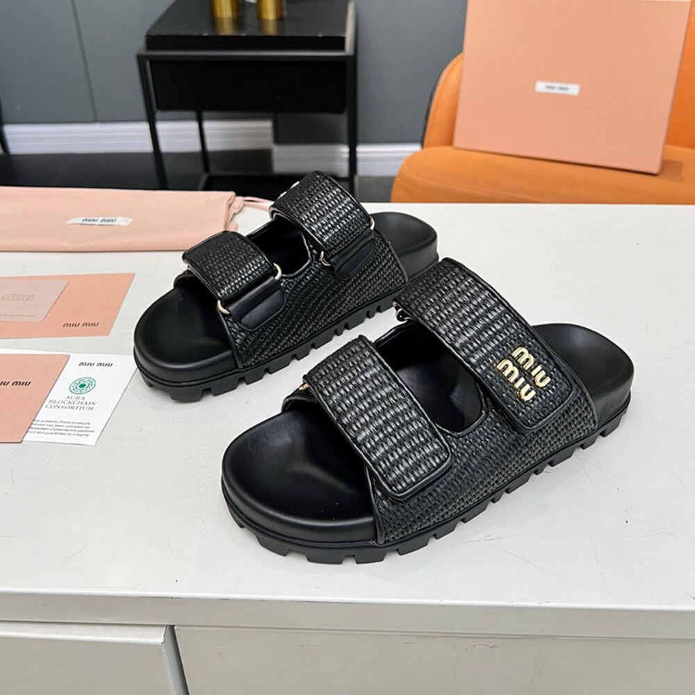 MiuMiu Raffia-effect woven fabric slides
