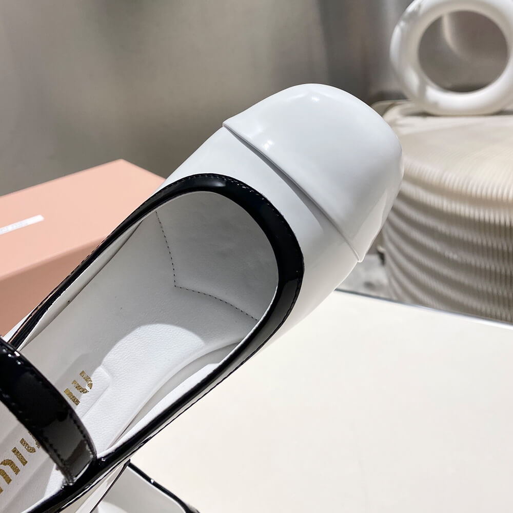 MiuMiu Two-tone patent leather Mary Jane pumps