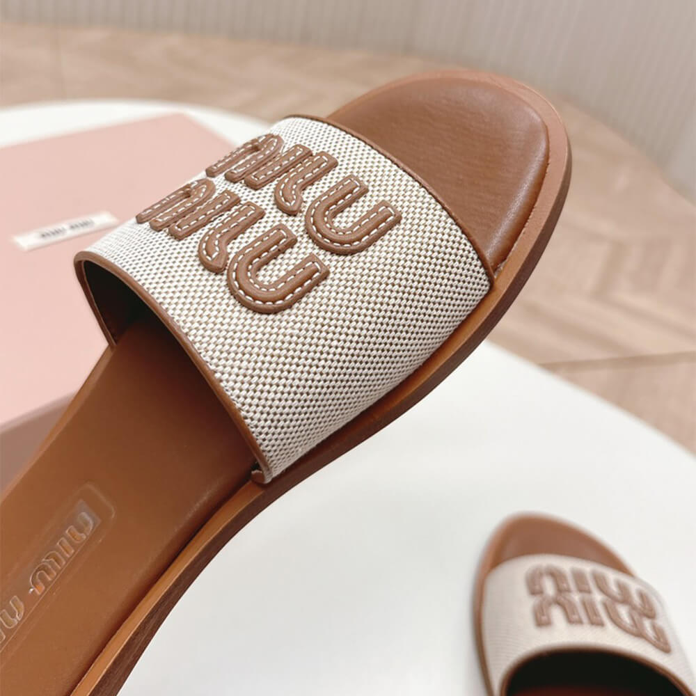 MiuMiu Canvas and leather slides